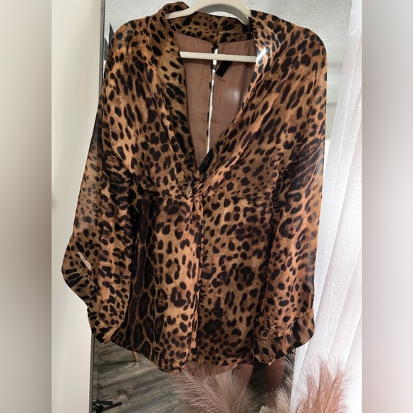 Leopard print boutique dress. Size M. It is on the shorter side. - Picture 2 of 3